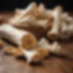 A variety of natural bone treats for dogs displayed on a wooden surface